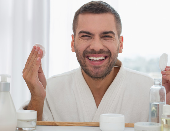 Man happy with products provided through medspa using the best medical spa software