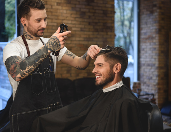 Gentlemen smiling as they discuss next appointment scheduling