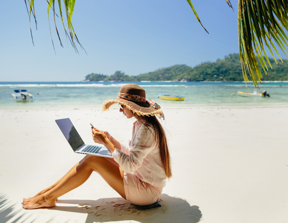 Client having a virtual appointment from the beach.