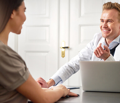 Practitioner working with a client using medical spa EMR software