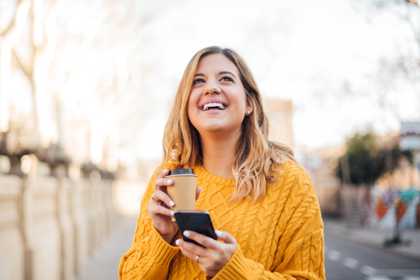 Medical Spa Owner on the go utilizing her phone for medical spa scheduling