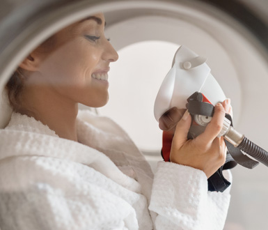 Client receiving hyperbaric oxygen therapy at a medical spa.