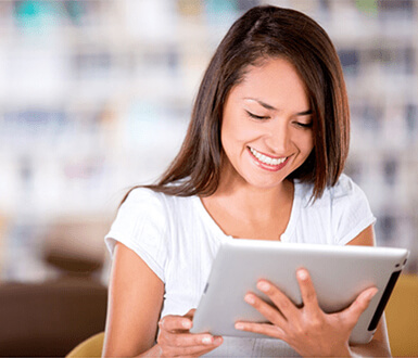 Spa employee reading on a tablet